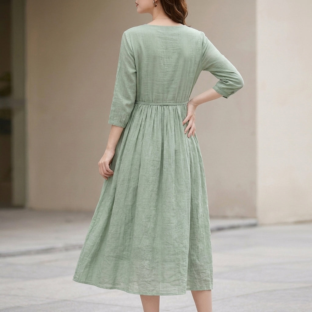 Flowing Belted Midi Dress with Ruffled Sleeves and Pleated Bodice