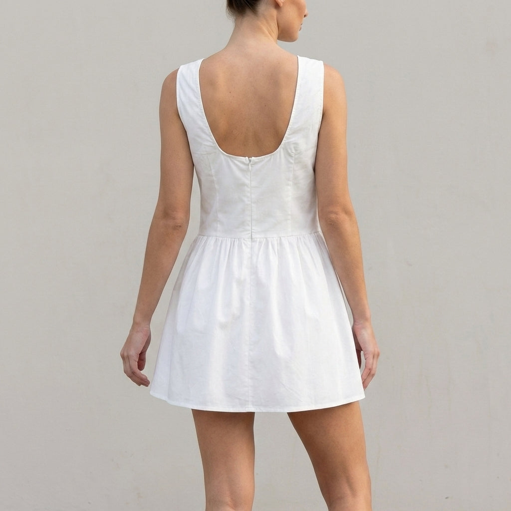 Fitted Sleeveless Mini Dress with Lace Insets and Gathered Skirt Detail