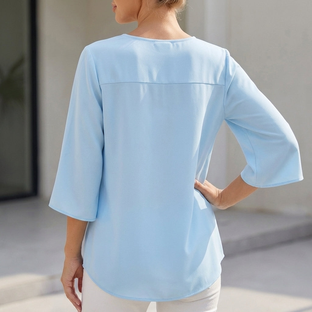 Effortless Flowing V-Neck Blouse with Curved Hem and Slit Sleeves