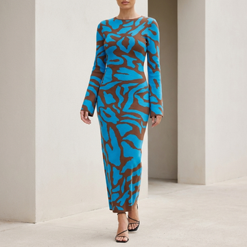 Sophisticated Fitted Knit Maxi Dress with Flared Cuffs and Abstract Motif
