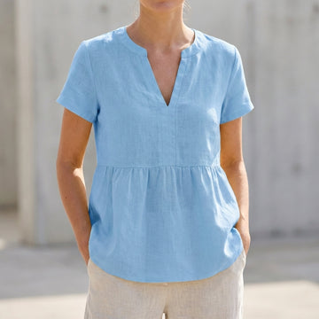 V-Neck Peplum Blouse with Pintuck Detailing and Curved Hem