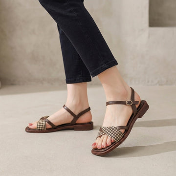 Elegant Square Toe Flat Sandals with Patterned Cross-Strap and Buckled Ankle