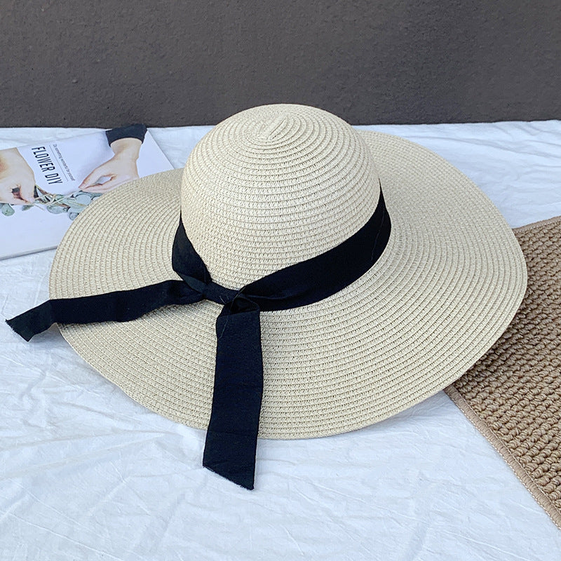 Elegant Wide Brim Woven Straw Hat with Bow Accent for Summer Escape